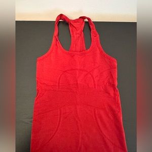 bright red lululemon swiftly tank top